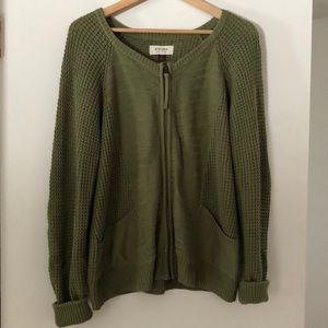 Green zip up sweater with pockets